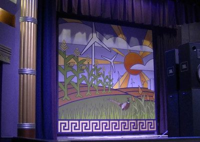 large mural of corn pheasant and windmills on Fowler Theatre stage