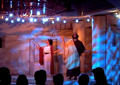 male and female Greek chorus on stage