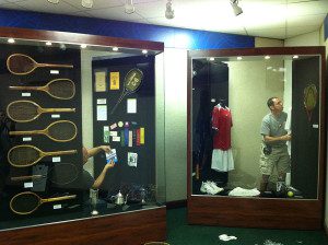 exhibit cases displaying historical tennis items