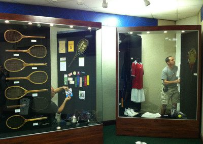 exhibit cases displaying historical tennis items