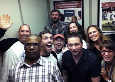 group of happy people in elevator