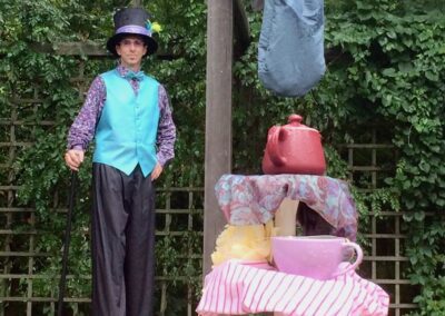 actors playing Mad Hatter and Caterpillar