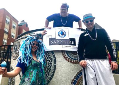 Three Sapphire entertainers smiling