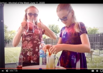 Screenshot of twin girls making cocktail