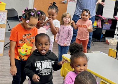 Preschool children and teacher in classroom