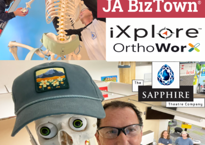 Educator posing with skeleton model, event logos